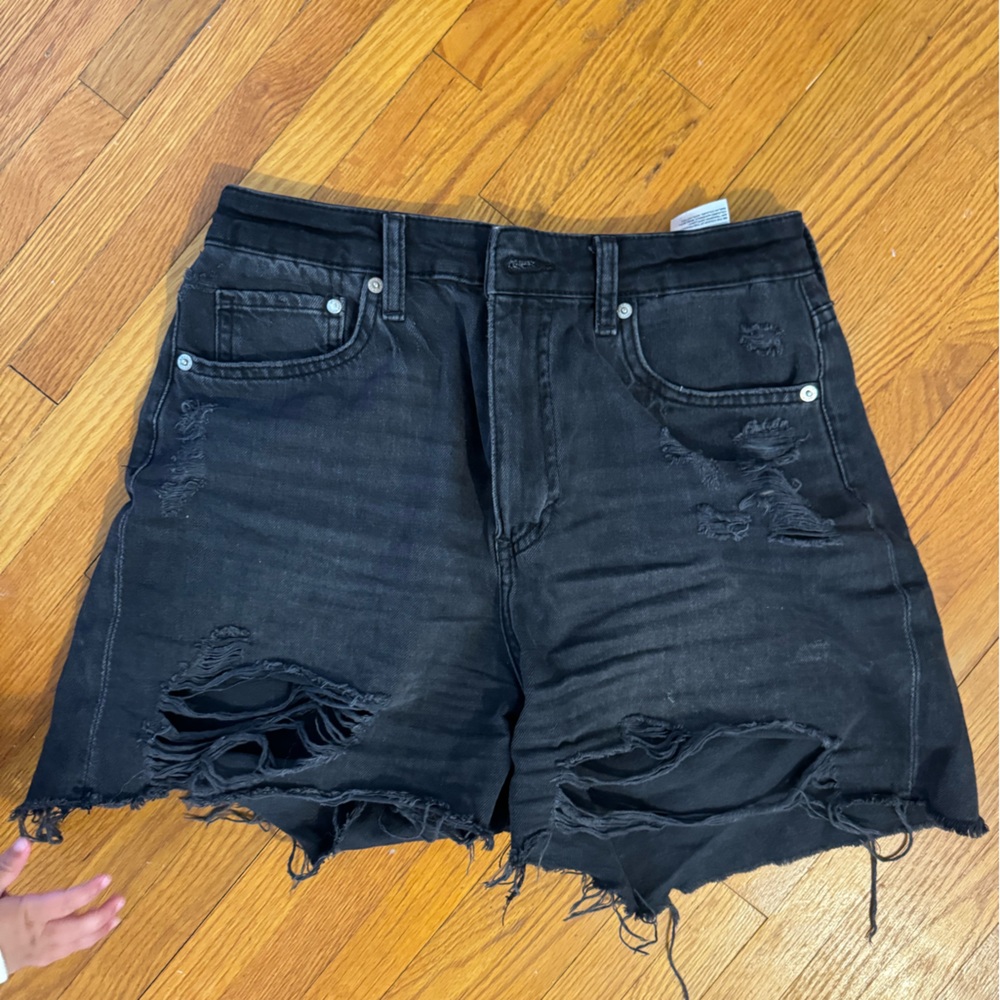 Distressed black denim shorts